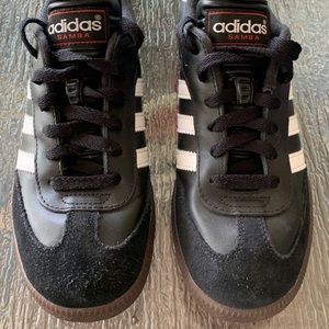 Adidas Samba Black with White Strips. Size 7.5 women or 5.5 men/boys.